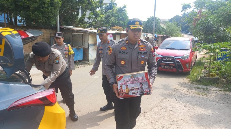 Kapolsek Batu Ampar Pimpin Penyerahan Bansos