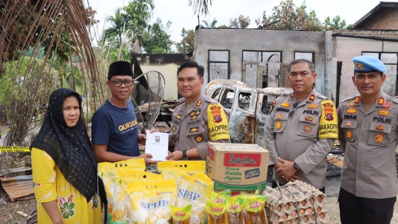Kapolres Labuhanbatu AKBP Dr. BL Malau, Salurkan Bantuan Kepada Keluarga Junaidi Marpaung